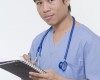 Male Nurse writing